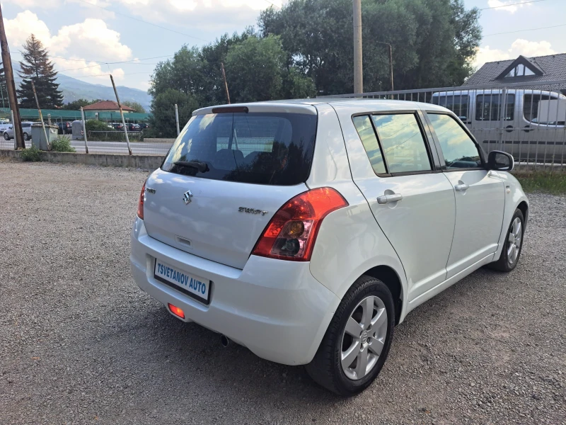 Suzuki Swift 1.3DDIS , снимка 7 - Автомобили и джипове - 51147203