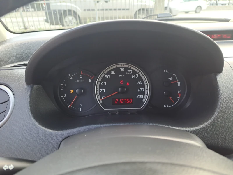 Suzuki Swift 1.3DDIS , снимка 14 - Автомобили и джипове - 51147203
