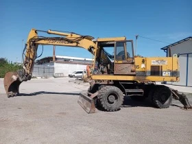      Cat 214 B