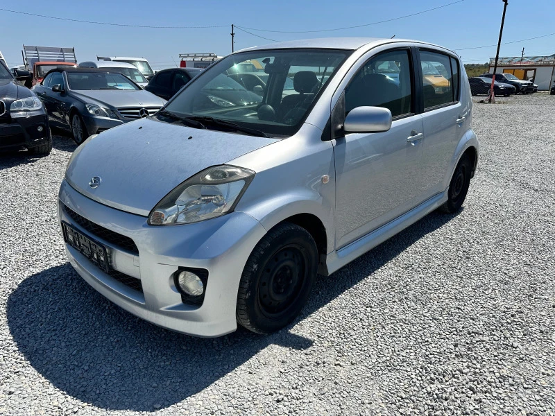 Daihatsu Sirion 1.3 4WD, снимка 3 - Автомобили и джипове - 46515444