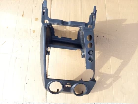 Централна конзола Санг Йонг Актион,Екшън 