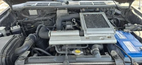 Mitsubishi Pajero, снимка 12 - Автомобили и джипове - 53425403