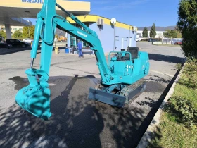  Komatsu PC007 | Mobile.bg    7