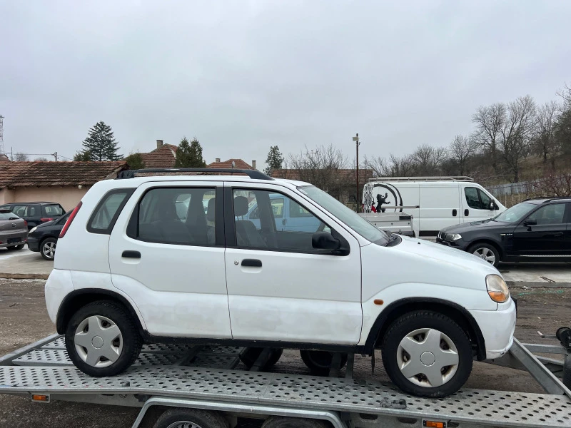 Suzuki Ignis 1.3 бензин 4х4 КЛИМАТИК, снимка 4 - Автомобили и джипове - 47293359