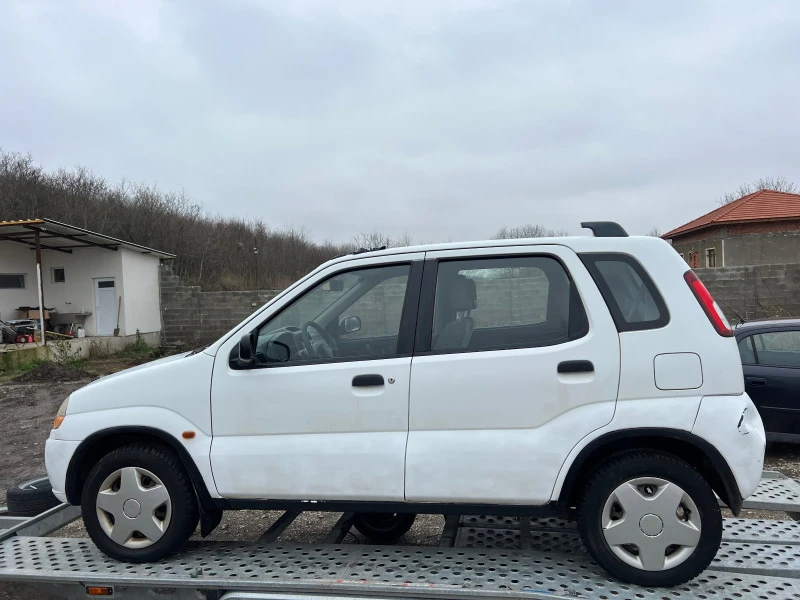 Suzuki Ignis 1.3 бензин 4х4 КЛИМАТИК, снимка 8 - Автомобили и джипове - 47293359