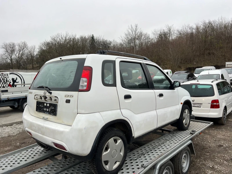 Suzuki Ignis 1.3 бензин 4х4 КЛИМАТИК, снимка 5 - Автомобили и джипове - 47293359