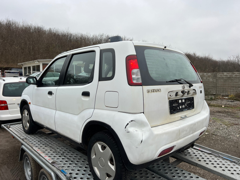 Suzuki Ignis 1.3 бензин 4х4 КЛИМАТИК, снимка 7 - Автомобили и джипове - 45860832