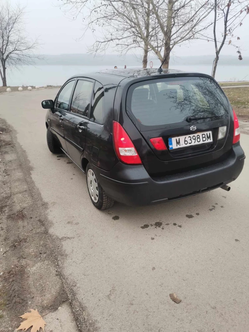 Suzuki Liana, снимка 12 - Автомобили и джипове - 49118817