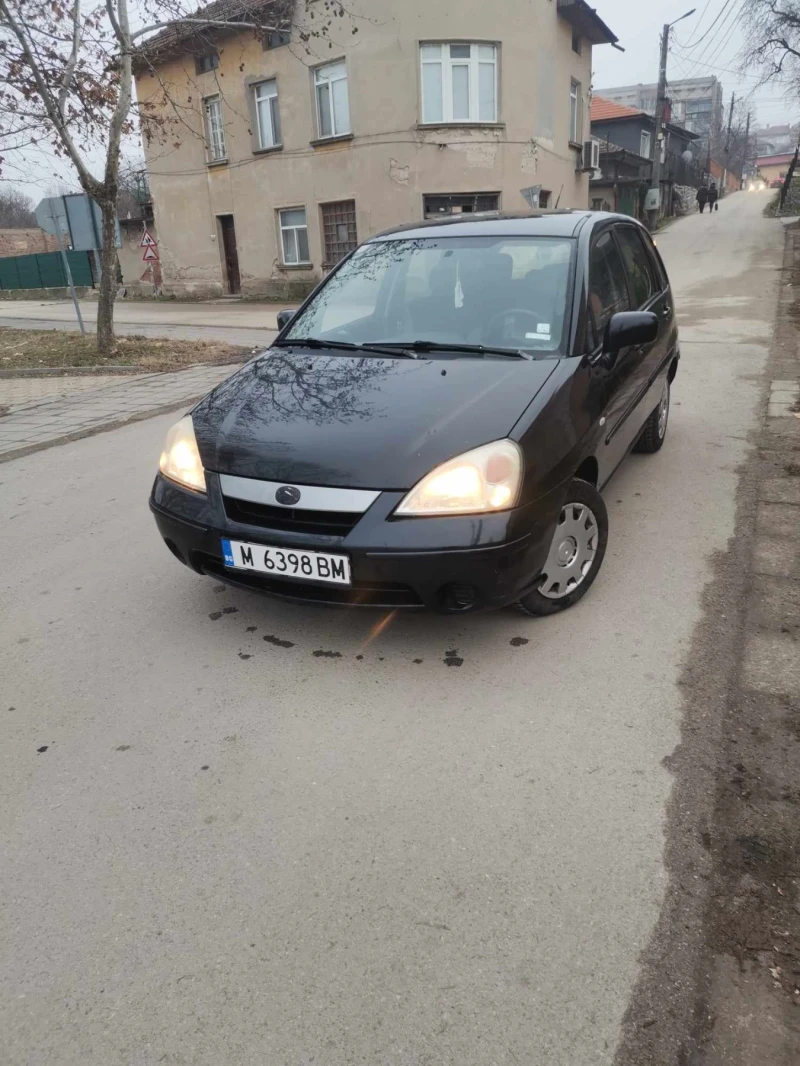 Suzuki Liana, снимка 6 - Автомобили и джипове - 49118817