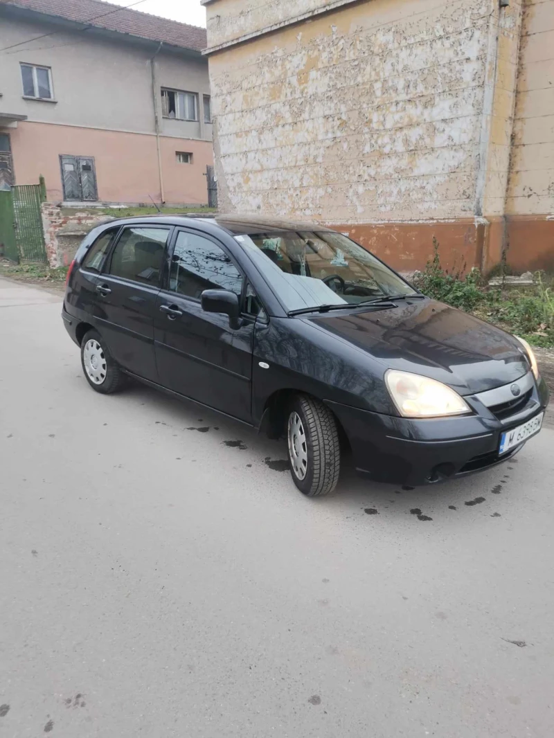 Suzuki Liana, снимка 8 - Автомобили и джипове - 49118817