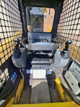 Мини челни товарачи Komatsu Sk714 , снимка 7
