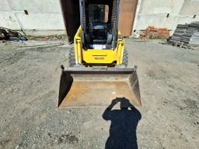 Мини челни товарачи Komatsu Sk714 , снимка 4