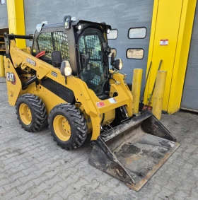 Мини челни товарачи Cat 242D3, снимка 1