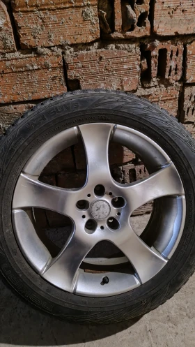        235/55R18