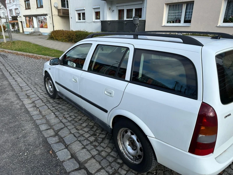 Opel Astra 1.6 Метан, снимка 6 - Автомобили и джипове - 48524742