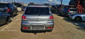 Mitsubishi Outlander 2.0 | Mobile.bg    5