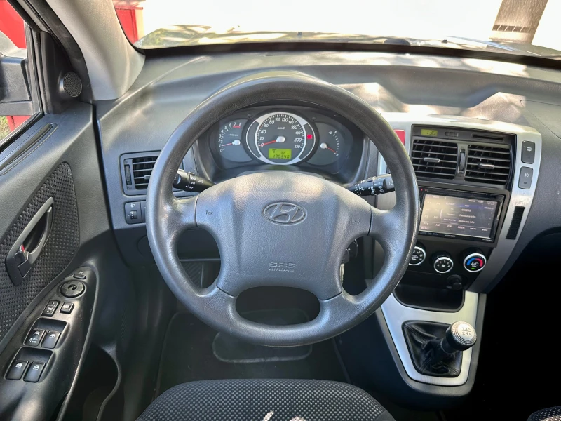 Hyundai Tucson 2.0 I GPL ТЕГЛИЧ, снимка 10 - Автомобили и джипове - 51771885