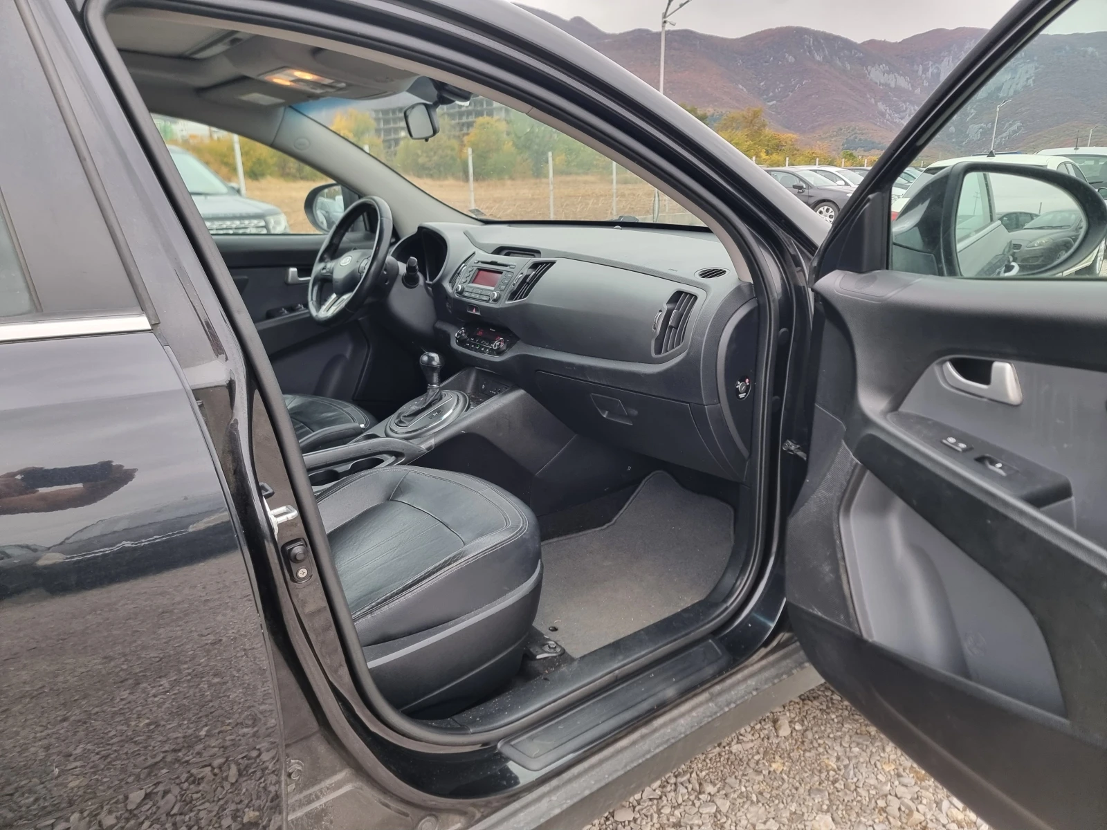 Kia Sportage 2.0CRDI, снимка 15 - Автомобили и джипове - 56471609