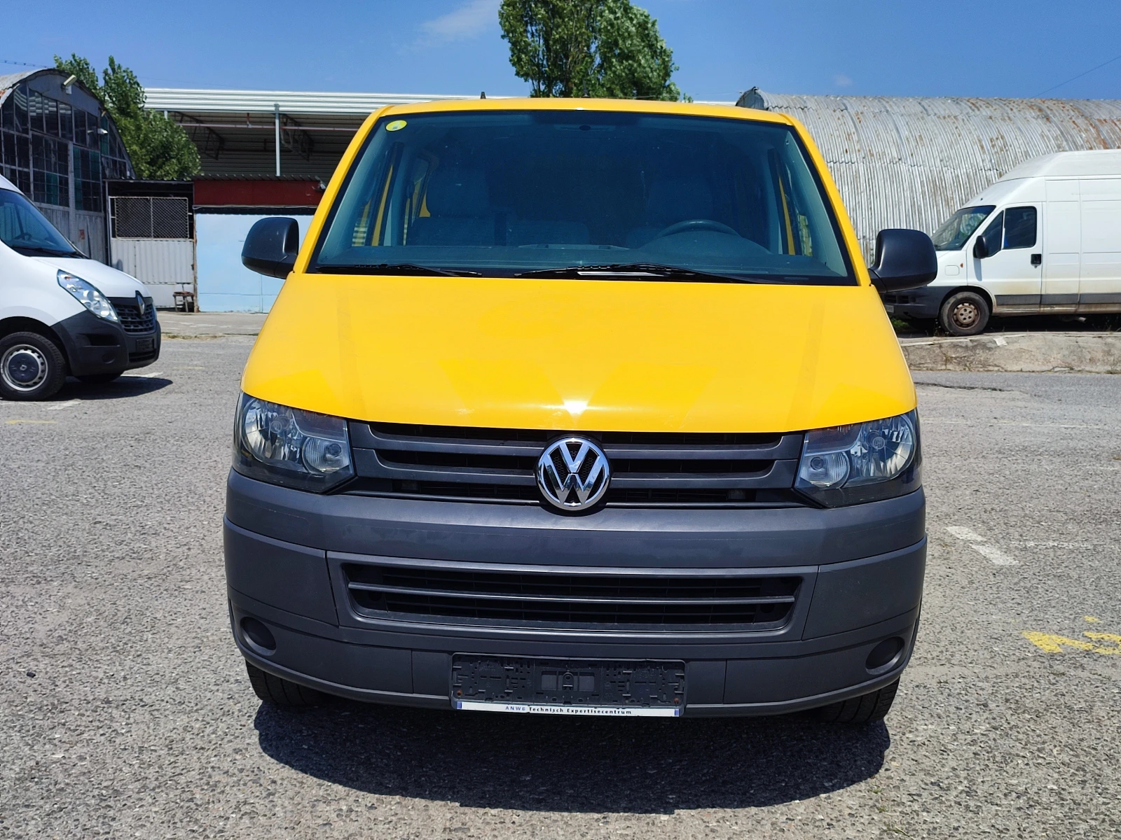 VW Transporter 2.0TDI-102kc-ЕВРО5-КЛИМАТИК-ПАРКТРОНИК-ТЕГЛИЧ, снимка 2 - Бусове и автобуси - 54558853