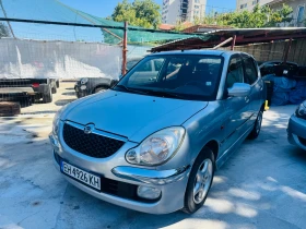 Daihatsu Sirion 1.3 Sport 4x4 Фейслифт, снимка 1