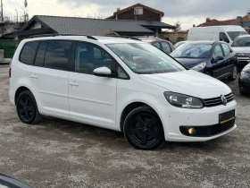 VW Touran 2.0TDI 140кс 6с 7-места НАВИ ПОДГРЕВ ПЕЧКА  - 7600 € / 14864.31 лв. - 74134356 7