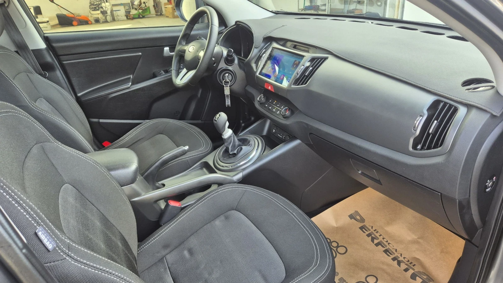 Kia Sportage 1.6 бензин 135к.с., снимка 14 - Автомобили и джипове - 53777315