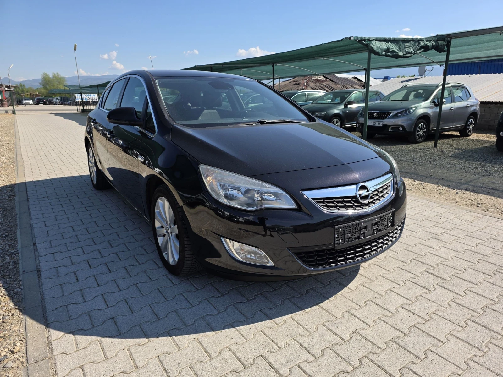 Opel Astra 1.6i Cosmo 116k euro5a Лизинг