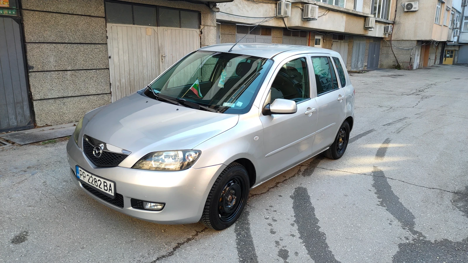 Mazda 2, снимка 9 - Автомобили и джипове - 56602010