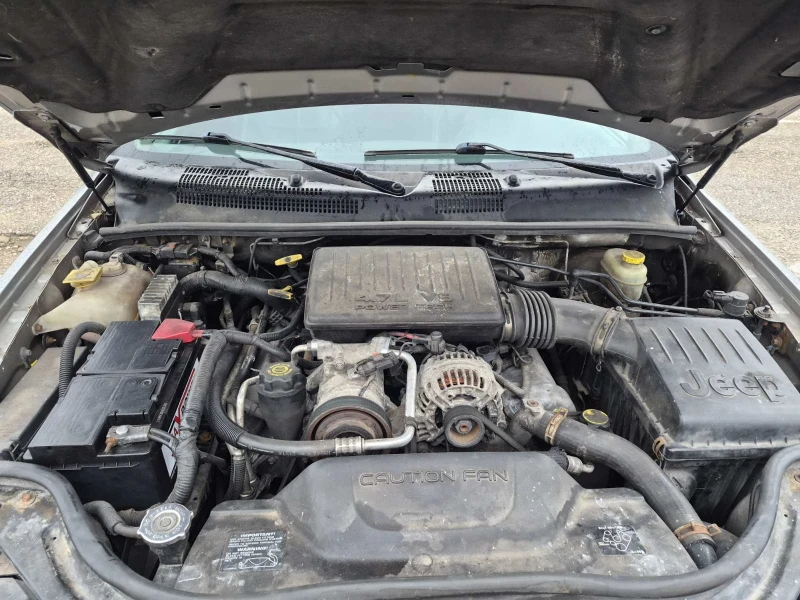 Jeep Grand cherokee 4.7 Quadra Drive , снимка 15 - Автомобили и джипове - 53071679