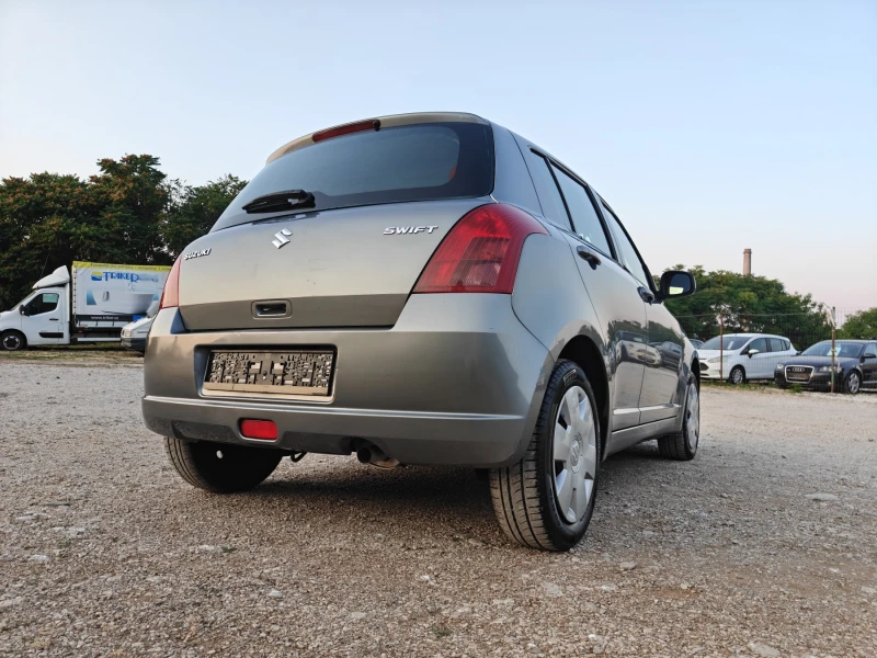 Suzuki Swift 1.3 KLIMA, снимка 7 - Автомобили и джипове - 50821522