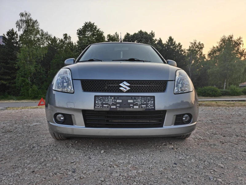 Suzuki Swift 1.3 KLIMA, снимка 3 - Автомобили и джипове - 50821522