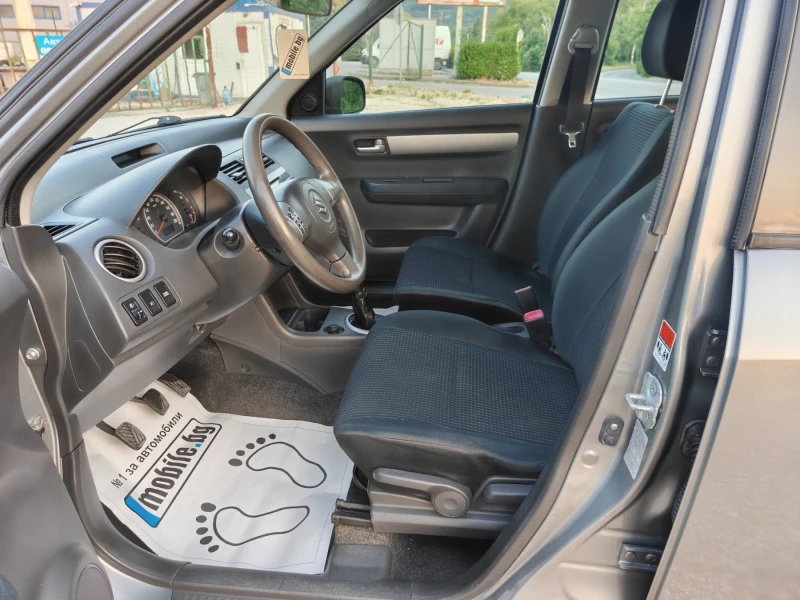Suzuki Swift 1.3 KLIMA, снимка 12 - Автомобили и джипове - 50821522