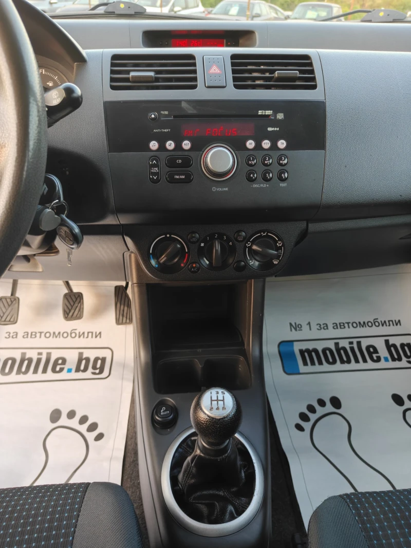 Suzuki Swift 1.3 KLIMA, снимка 13 - Автомобили и джипове - 50821522