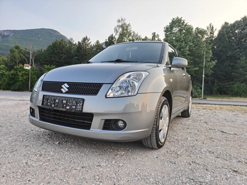 Suzuki Swift 1.3 KLIMA, снимка 4 - Автомобили и джипове - 50821522