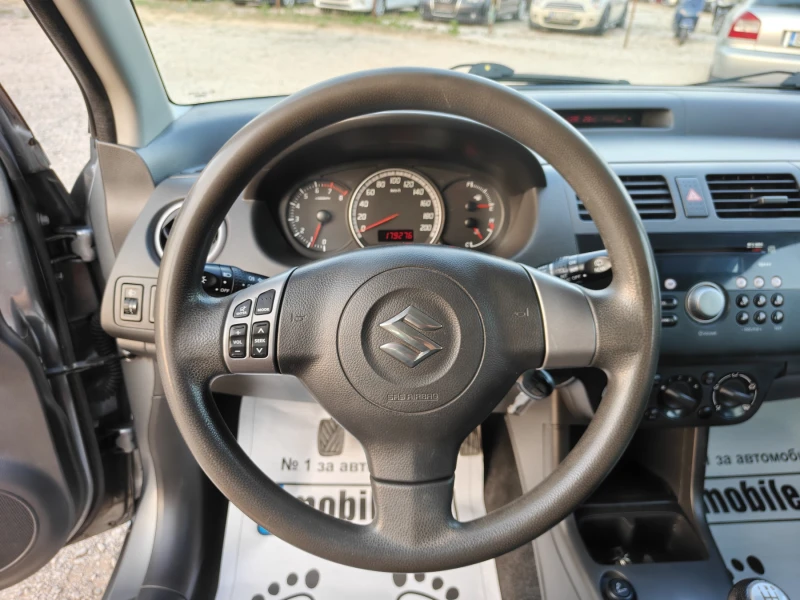 Suzuki Swift 1.3 KLIMA, снимка 14 - Автомобили и джипове - 50821522