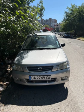 ������ Mazda Demio