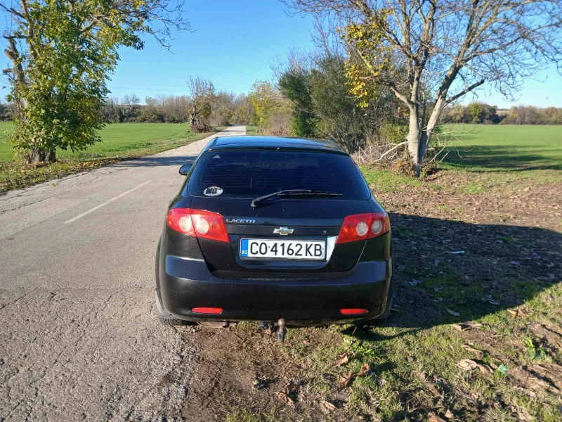Chevrolet Lacetti 1.6газ  гаражен клима , снимка 5 - Автомобили и джипове - 52901377