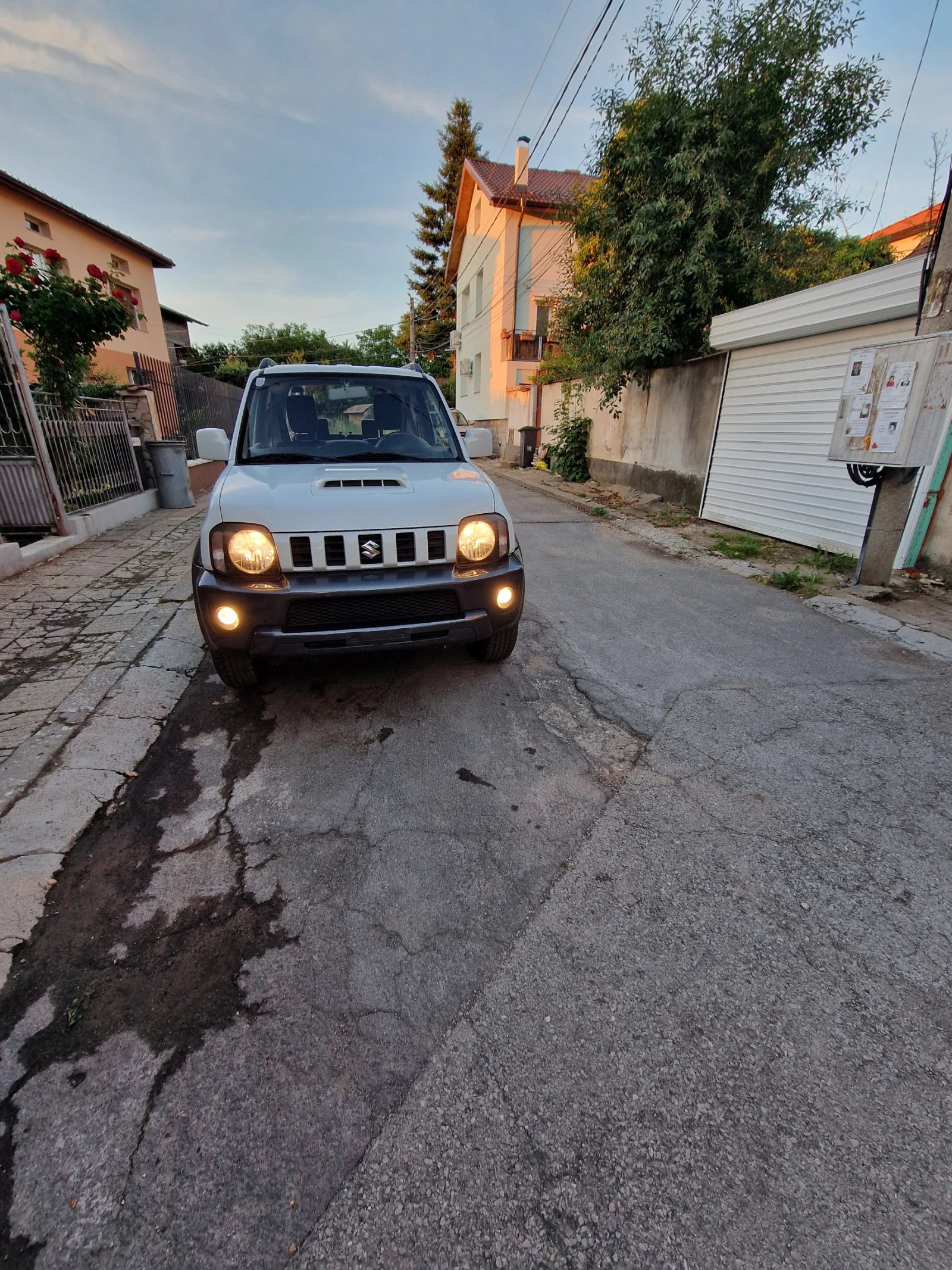 Suzuki Jimny 1.3i, снимка 14 - Автомобили и джипове - 54918723