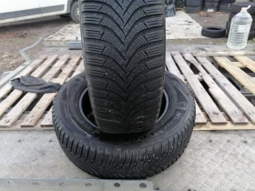Гуми Зимни 215/65R16, снимка 2 - Гуми и джанти - 52842903