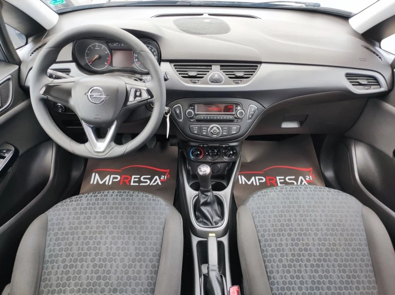 Opel Corsa 1.2i 70kc., снимка 12 - Автомобили и джипове - 46202118