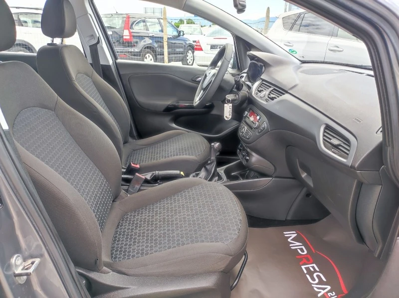 Opel Corsa 1.2i 70kc., снимка 13 - Автомобили и джипове - 46202118