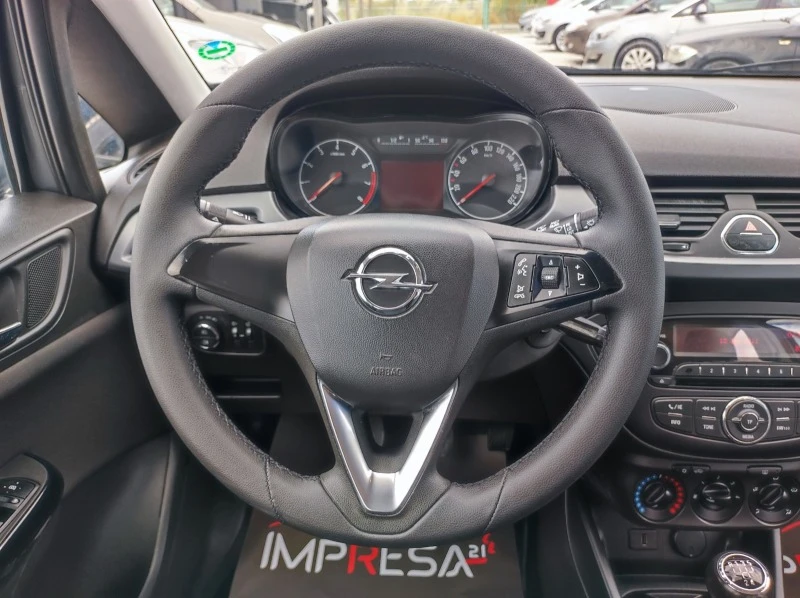 Opel Corsa 1.2i 70kc., снимка 15 - Автомобили и джипове - 46202118