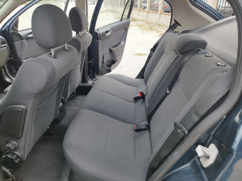 Opel Astra 1.6 i 85kc., снимка 10 - Автомобили и джипове - 52076514