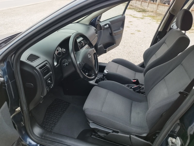 Opel Astra 1.6 i 85kc., снимка 11 - Автомобили и джипове - 52076514