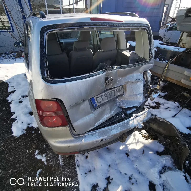 VW Touran 2.0-109кс, снимка 7 - Автомобили и джипове - 49532399