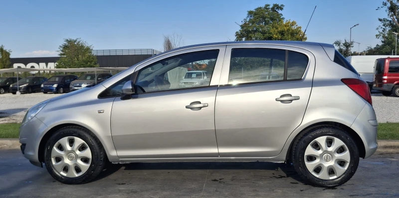 Opel Corsa Enjoy 1.2i 80PS, снимка 6 - Автомобили и джипове - 51646124