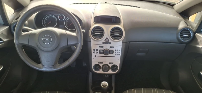 Opel Corsa Enjoy 1.2i 80PS, снимка 9 - Автомобили и джипове - 51646124