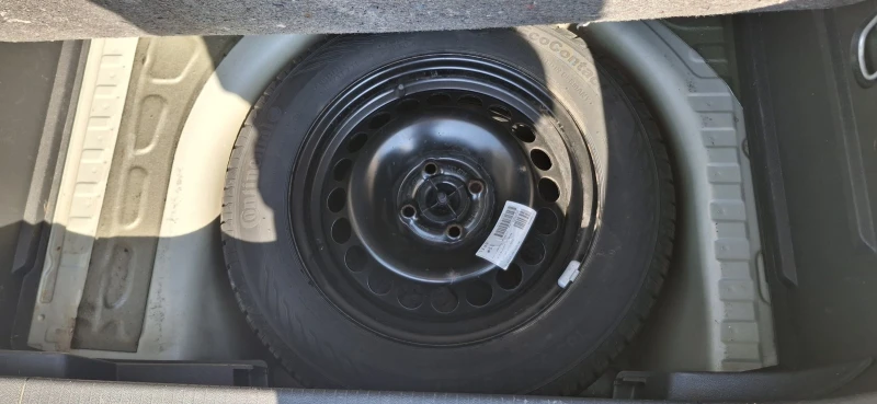 Opel Corsa Enjoy 1.2i 80PS, снимка 16 - Автомобили и джипове - 51646124