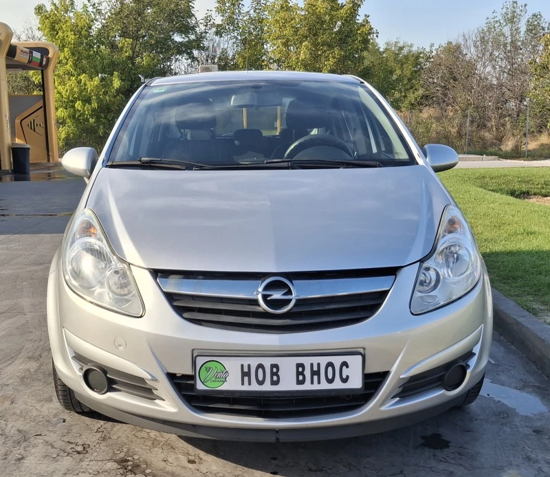 Opel Corsa Enjoy 1.2i 80PS, снимка 8 - Автомобили и джипове - 51646124