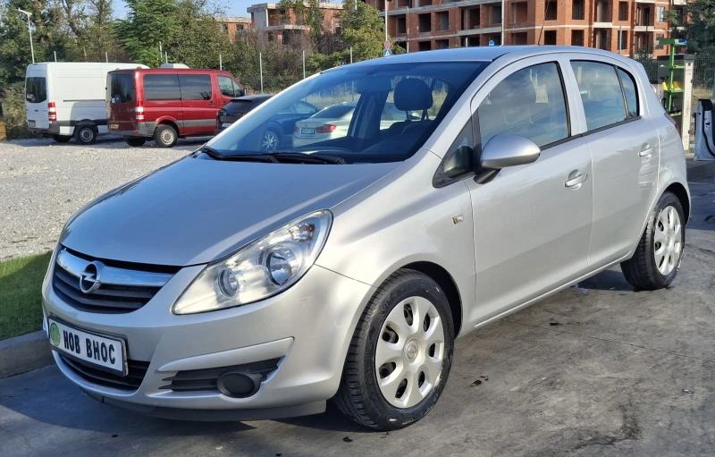 Opel Corsa Enjoy 1.2i 80PS, снимка 7 - Автомобили и джипове - 51646124